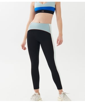 High rise 7/8 length active leggings. Squatproof fabrication with contrast panels & piping in seam. P.E Nation embroidered at ankle