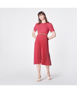 Full of vintage charm, our Avalon dress is a modern interpretation of beautiful Thirties' dress shapes. Crafted from stylish crepe in raspberry pink, it has a round neck with pleat detail, folded short sleeves, pleating at the bust, a nipped waist and falls to a midi-length pleated skirt. Wear with a tweed jacket early in the season or with strappy heels for spring occasions.