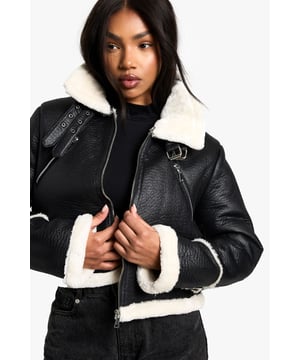 Take your outfit to new style heights with an aviator jacket. Perfect for layering, create a stylish oversized silhouette as you choose from crop belted jackets to faux fur lined options. A cross between a classic flight jacket and a leather biker, it's all about the detailing with this snug winter staple. Pair your aviator coat with high waisted mom jeans and a fierce attitude as you stroll your way through your social calendar.Style: Aviator JacketFabric: PULength: Cropped