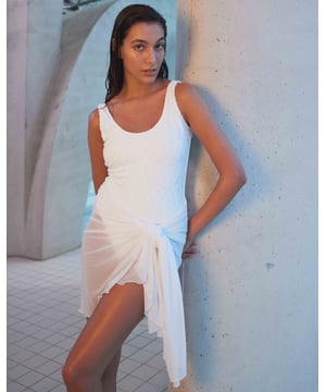 Hitting the beach, pool or spa? Opt for this easy, breezy towelling swimsuit. Look closely and you’ll see our signature shark logo woven into the jacquard fabric, an open plunge back, and extra coverage to the front and rear.