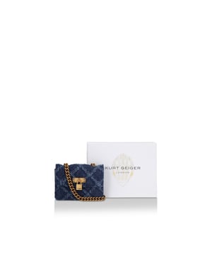 This Kurt Geiger Micro Brixton Lock bag features a denim exterior with frayed quilt design on the front. There is an antiqued brass branded lock on the front flap. 7.5cm (H), 11cm (L), 3cm (D). Strap length: 121cm.