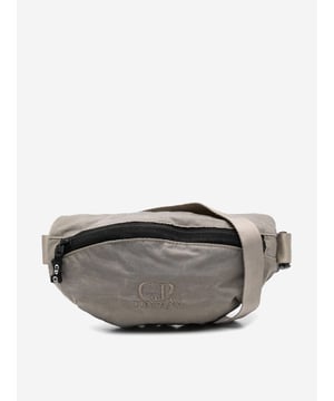 Introducing the Boys Logo Belt Bag in Green by CP Company‚ an essential accessory for AW2024, blending high-end craftsmanship with functional design. Key features include:‚ Signature CP Company Aesthetics: Showcases the iconic logo in a vibrant green hue, ensuring standout style.  ‚ Ergonomic Design: Perfectly sized for boys, with adjustable straps for a comfortable, custom fit.  ‚ Durable Material: Crafted from premium materials, built to withstand daily wear and tear.  ‚ Versatile Accessory: Elevates any outfit, from casual to chic. Ideal for everyday adventures or special occasions.Add this stylish and sturdy piece to your boy's wardrobe today!