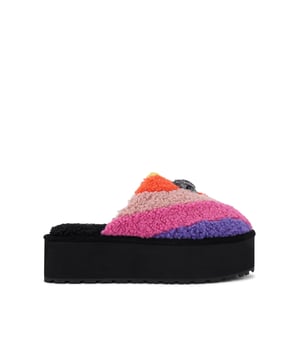 This Kurt Geiger Kensington Pump Slippers has a faux shearling upper in a rainbow stripe design. There is an antiqued silver eagle head with rainbow crystals on the toe. Sole height: 5cm.