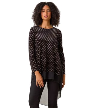 Glitter Spot Print Chiffon Hem Tunic Top from Roman. Embrace your inner style with our fabulous spot print tunic top. Cut from a stretch jersey for easy pull-on dressing, this piece features a round neckline and flattering 3/4 length sleeves. Adots for days print to stand out at your next special party. Finishing with a low chiffon hem and split back detail adds a sophisticated touch. Wear with leather trousers for an unforgettable evening style.