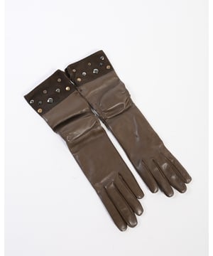 100% cuero genuino.
  Color marron.
  Fabricado en Italia.
  Disenado exclusivamente para mujeres.