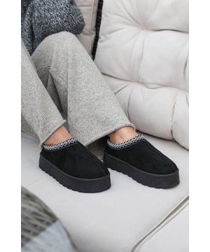 Stay stylish and comfortable all day with our Freeze Flatform Embroidered Low Ankle Slipper Boots. These boots are a perfect addition to your footwear collection, featuring a chic design that you can dress up or down.
Key Features:


Effortless Style: The sleek and minimalist design of these boots ensures that they complement almost any outfit you wear. They are perfect for dressing up or down and exude casual elegance that adds an extra flair to your style.

All-Day Comfort: Our boots are built with your comfort in mind. They feature a soft and comfortable interior lining that provides maximum comfort, ensuring you can wear them for long periods with ease.

Durable Construction: Our Low Ankle Slipper Boots are made with high-quality materials that ensure long-lasting durability. They feature a sturdy construction and reliable stitching that makes them practical and sustainable for everyday use.

Specifications:

Material: Faux Suede
Closure: Slip On
Heel height: 1 inch
Toe shape: Round

Invest in our Allegra Flatform Embroidered Low Ankle Slipper Boots for a perfect combination of style and comfort. Enjoy the joy of comfort with every step you take. Get yours today and step out with confidence and style!