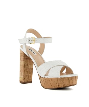 Stride towards summer in standout sandal Jealous. Crafted with the finest materials, the strappy upper pattern is set on a natural cork-platform sole, evoking warm-weather styling with every step. Finished with a supportive ankle strap with a metal side buckle, this block-heeled silhouette will let you navigate dressing for the sunshine with ease this season.