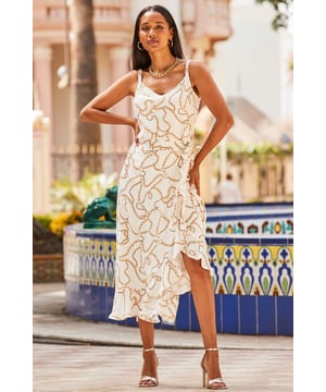 Score max new season style points
On-trend chain print looks so luxe
Made-to-flatter wrap style
Gorgeous ruffle trim
Create a co-ord with the matching cami
Add a leather biker for effortless chic