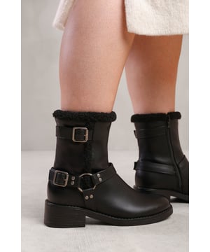 Step into the spotlight with our Olivia Ankle Boot with Buckle Detailing. These stylish boots are designed to make a statement and add a touch of sophistication to any outfit.


Key Features:



Effortless Style: The block heel and buckle detail create a unique and eye-catching look. These ankle boots effortlessly elevate your style, making you stand out from the crowd.

Easy to Wear: The zip and buckle detail make it easy to slip these boots on and off, saving you time and hassle.

Durable Construction: Made with high-quality materials, our boots are built to last. The sturdy construction and reliable stitching ensure their durability, making them perfect for everyday wear.


Specifications:


Material: Faux Leather
Closure: Zip
Heel Height: 3' (7.6cm) approx


Invest in our Olivia Ankle Boot with Buckle Detailing for a perfect combination of style, comfort, and sophistication. Make a statement and turn heads wherever you go. Get yours today and step into a world of fashionable elegance!