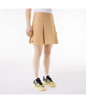 Womens Lacoste Short Pleated Cotton Skirt - Pleated on front and back - Cotton gabardine - Opens on right side - Sewn-on embroidered crocodile - Ref: JF6917-IXQ
