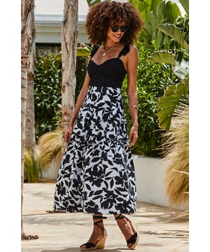 We're obsessed with it too
High waist, pleat detail - it's cut to flatter
Ultra-feminine full midi hem
Monochrome florals always look chic
Style with strappies and a Bardot top for special occasions
Dress it down with a vest top and sandals