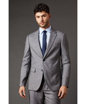 Slim fit design for a modern, tailored silhouette
        Sharkskin texture adds subtle depth and interest
        Notched lapels and two-button closure for classic styling
        Flap pockets and chest welt pocket for practicality and style
        Versatile mid-grey hue suitable for various occasions
    
    This Burton slim fit suit jacket radiates sophistication and versatility, perfect for the modern gentleman who appreciates timeless style with a contemporary edge. The sharkskin texture lends a subtle depth to the fabric, catching the light in a way that adds intrigue to your ensemble. Pair it with the matching trousers for a complete look that's ready for the boardroom, or dress it down with dark denim for smart-casual events. The jacket's slim cut flatters the physique, creating a sharp silhouette that's ideal for everything from important business meetings to after-work drinks with colleagues. Accessorise with a crisp white shirt and a bold tie to make a statement, or opt for a light blue shirt for a softer approach. This versatile piece is a wardrobe essential for the man who moves effortlessly between professional and social settings, always looking impeccably put together.