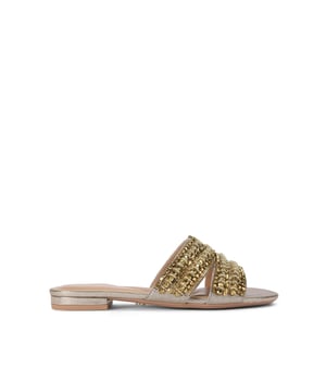 This Carvela Pageant Mule sandal is crafted from a metallic gold fabric and each of the two straps are embellished with statement gold crystals.
