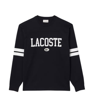 Das Lacoste Herren-Langarm-T-Shirt mit Rundhals-Ausschnitt präsentiert sich mit einem auffälligen Silikon Krokodil-Aufnäher vorne und sportlichen Kontraststreifen an den Ärmeln. Der Regular Fit verleiht diesem Shirt nicht nur einen zeitgemäßen Look, sondern auch höchsten Tragekomfort für einen lässigen und dennoch gepflegten Auftritt.