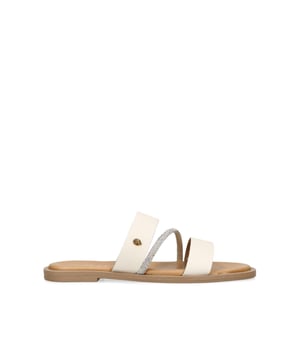 This Kurt Geiger Strand Flat Sandal features a bone leather upper with a complementing crystal embellished strap. There is a micro antiqued brass eagle head on the outer side of the upper strap.