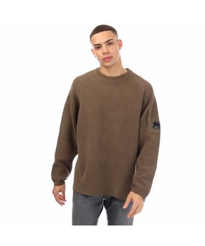 Heren C.P. Company Chenille Crewneck Waffle Knit Sweater in walnoot.- Geribde ronde hals.- Geribde manchetten en zoom.- Opgezette mouwzak met Company Lens detail.- Kleding geverfd.- 7 Gauge breisel.- Normale pasvorm.- 100% Katoen.- Ref: 17CMKN040A359
