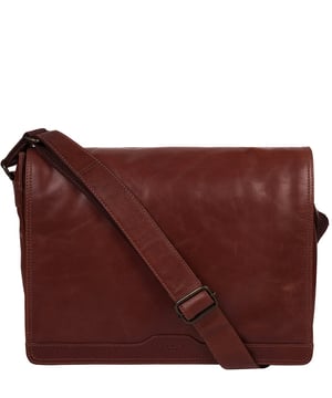 Handcrafted from full-grain natural leather, the 'Zico' messenger bag from Conkca London comes with a robust finish. The handsome accessory features a fold-over top secures a spacious central compartment which is lined with natural, untreated 100% cotton lining alongside rustic metal fittings and zips. Ample storage space is provided by a padded laptop pocket on the interior. Comes with an adjustable strap with a maximum drop length of 70cm and adorned with the handsome Conkca leather label.