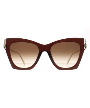 Las gafas de sol Alexander McQueen Cat Eye de mujer en degradado marrón dorado am0375s son unas elegantes gafas de sol estilo ojo de gato confeccionadas en acetato ligero. El logotipo de Alexander McQueen está incrustado en las patillas delgadas para la autenticidad de la marca.