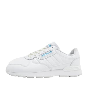 Stap in de nostalgie van de jaren '80 met de Trezoid 2 sneakers voor heren van adidas Originals. Geïnspireerd door klassieke ontwerpen, hebben deze sneakers een zacht en duurzaam volnerflederen bovenwerk in Wit en Dash Grijs, gecombineerd met een ademende textiele tong. De EVA-middenzool biedt langdurige demping, terwijl de ondersteunende hielclip extra stabiliteit garandeert. Een rubberen zool en tonale 3-Stripes maken de vintage look compleet.