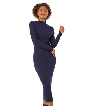 Dusk Button Detail Knitted Midi Dress from Roman. Set the trend this season in our trendy ribbed knit midi dress. Featuring a high neckline and sophisticated midi-length finish. The button detail on the shoulders adds a unique touch to this knitted bodycon style. Dress it up with your favourite winter boots, tights, and coat for a perfect Autumn look!