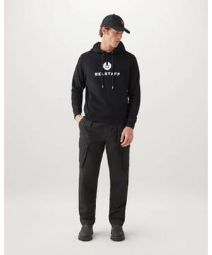 Cast in block colour, the Belstaff Signature Hoodie in Dark Ink brings boldness to relaxed settings. A large pouch pocket adds to its practicality.


Cotton fleece
Hooded logo sweatshirt
Ribbed cuffs and hem
Adjustable drawstring hood
Large front pouch pocket
Phoenix logo on the chest
100% cotton. Rib: 98% cotton, 2% elastane
Product ref: 104140DKINK


 