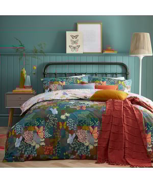 Inspired by a garden wonderland, the teal green background compliments the array of coloured butterflies and flowers. Complete with a pastel contrasting reverse, this design will be the perfect injection of colour into your bedroom.