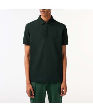 Heren Lacoste Paris Poloshirt Regular Fit Stretch Cotton Piqué Unicolour stretch katoen piqué Overhemdkraag met verborgen knoopsluiting Regular fit Geribbelde afwerking op kraag en mouwen Geborduurde ton sur ton krokodil op de borst