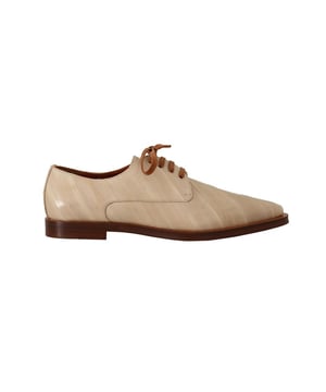 Marca: Dolce & Gabbana.
  Modelo: Pisos formales.
  Color: Beige.
  Material: 100% cuero de anguila.
  Suela: Cuero.
  Cierre: Con cordones.
  Detalles del logotipo.
  Alta calidad y comodidad.
  Fabricado en Italia.