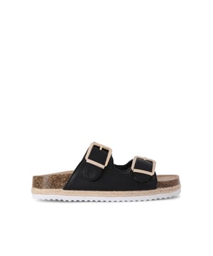 The Carvela Paradise is a slip-on sandal with black upper. There are two straps across the foot that are fastened with two gold buckles. The moulded footbed and sole features a rope effect with rubber outsole.