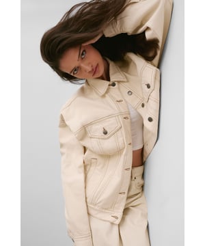 Boxy, oversized fit for a relaxed and trendy silhouette
        Classic denim construction with sturdy button-up front
        Functional chest pockets for added utility and style
        Versatile design suitable for layering over various outfits
        Timeless collar detail for a polished finish
    
    The Oversized Denim Jacket from NastyGal is a wardrobe essential that effortlessly combines comfort with style. This boxy-fit jacket offers a contemporary twist on a classic design, perfect for those seeking a relaxed yet fashionable look. The versatile nature of this piece allows for endless styling possibilities, making it a go-to choice for casual outings and laid-back events. Pair it with wide-leg trousers and chunky trainers for a trendy daytime ensemble, or throw it over a midi dress for a chic contrast at family gatherings. The jacket's roomy silhouette makes it ideal for layering over jumpers during cooler months, while its timeless appeal ensures it will remain a staple in your wardrobe for seasons to come. Whether you're heading to a casual brunch or a relaxed evening with friends, this NastyGal denim jacket will add an effortless cool to any outfit.