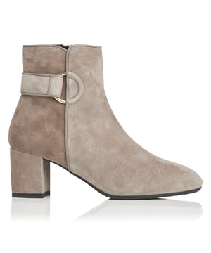 The Abi boots are made from soft grey suede. Perfect for every day, this sleek pair is distinguished by a block heel, round toe and hoop detailing on the ankle. An essential investment boot, wear yours with everything from denim to dresses.