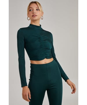 Grab this Shimmer Ruched Long Sleeve Top and keep all eyes on you. For an easy throw-on-and-go option, pair with our Shimmer Flared Trousers. Make a bold statement with colour block heels for an insta-worthy fit.