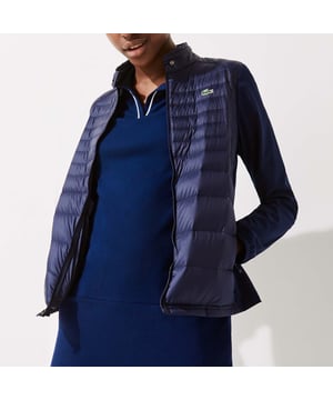 Women's Lacoste SPORT Down Technical Golf Jacket- Buttoned stand-up collar- Lightweight  water-resistant technical mini ripstop fabric with feather and down quilting- Zip side pockets- Stretch panels on sides and elasticised accents on sleeves - Green crocodile transfer on chest- Ref: BF9267-423
