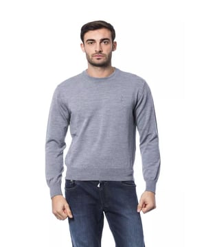 Grijze Merino Wol Trui  
Gemaakt van kwaliteitsvolle merinowol  
Ronde hals ontwerp  
Geborduurde details  
Biedt warmte en comfort  
Veelzijdige keuze voor elke gelegenheid  
Materiaal: 100% Merinowol