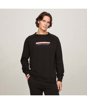 Mens Tommy Hilfiger Logo Track Top in black.- Round neck.- Ribbed cuffs and hem.- Printed logo.- Regular fit.- Ref: UM0UM02363BDS