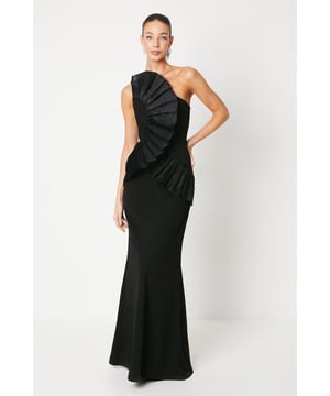 Exquisite one-shoulder design with elegant pleated detailing across the bodice
Crafted from scuba crepe fabric that drapes beautifully
Floor-sweeping maxi length for a sophisticated silhouette
Asymmetric neckline adds a modern touch to this timeless gown
Fully lined for a smooth and flattering fit

Radiate sophistication and elegance in this stunning one-shoulder gown from Coast. The pleated detailing across the bodice exudes a refined aesthetic, while the floor-sweeping maxi length creates a graceful silhouette. Crafted from scuba crepe fabric, this gown drapes beautifully, ensuring a flattering fit. Style it with statement jewellery and heels for a formal event like a wedding or the races, where you're sure to turn heads with your polished and expensive-looking ensemble.