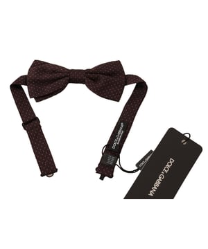 100% authentieke Dolce & Gabbana vlinderdas met metalen sluiting
  Exclusieve Dolce & Gabbana collectie
  Kleur: Bruin met stippenpatroon
  Model: Gebonden
  Materiaal: 100% Zijde
  Verstelbare nekband een maat
  Vervaardigd in Italie