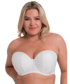 Introducing the Curvy Kate Luxe-Updated strapless bra! As a bestseller, we've updated and perfected this go-to. With its beautiful balcony shape and padding to enhance your bust, you'll look fabulous any time of day. And don't worry - it's secure with its vertical flat seamed cups and supportive inner side sling, plus a silicone grip on the band to keep it firmly in place. It fastens with a hook and eye closure and the multi-way adjustable strap gives you control over how it fits. The plain opaque fabric is perfect for everyday classic wear that you can rely on. Look no further than this must-have for comfortable support that looks great!

Bestseller has had a makeover
Must-have especially for bigger busts
Flattering balcony shape
Padding enhances your bust
Vertical flat seamed cups that ensure a secure fit
Supportive inner side sling
Silicone grip at the band to keep it in place
Underwired
Hook and eye closure
Multi-way adjustable straps
Plain opaque fabric for daily and classic wear
Country of origin: China&nbsp;
Composition: Main: 84% Nylon | 16% Elastane
Composition: Lining: 100% Nylon
Composition: Lining 2: 100% Polyester
Composition: Wing Mesh: 77% Nylon | 23% Elastane | Excluding trims
Listed in UK sizes