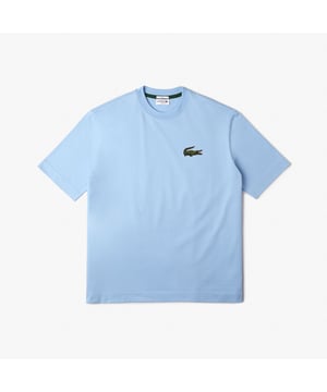 Finest materials. Brand’s singular expertise. The perfect expression of Lacoste’s timeless wardrobe -Loose fit is loose ease on body and sleeves  lower shoulders and armholes -Unisexe T-shirt in organic heavy jersey with big croc 80' on chest -7cm iconic original badge crocodile at chest -3cm green crocodile at under middle back collar