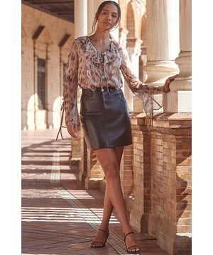 We consider it a wardrobe staple
Crafted from butter-soft leather for ultimate luxury
Cut for a flattering A-line fit
Work, weekend, night out - it's got you covered
Effortless chic with a striped knit and boots
Dress it up with strappy heels and a glam top