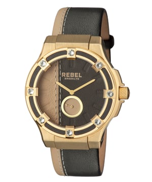 “B   e a rebel in pursuit of your dreams”           This line, which is quoted on the caseback of the watch, is the essence of the Flatbush collection. True rebellion can come in many forms and the dial colors that melt straight into the perfectly matching band colors is one of a kind. 8 crystals on the bezel and the contrast color subdial break the monotony of the look. This is truly the rebellious way to achieve your dream look.Rebel Flatbush Black/Gold Dial Women's Watch RB119-9071
Rebel Women's Watch from the Flatbush Collection
Round 316L Stainless Steel Gold Case
Black/Gold Dial, Mineral Crystal
Black/Gold Leather Band with Tang Buckle
Water Resistance: 5 ATM (50 meters, 165 feet)
11mm Case Thickness, 44mm Case Diameter, 23mm Band Width
Quartz Movement