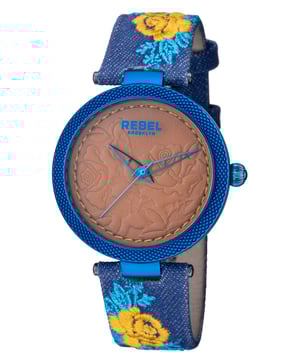 “   why fit in when you were born to stand out?”           This line, which is quoted on the caseback of the watch, is the essence of the Carrol Gardens collection. The dial with its leather look embossed with roses complements the canvas covered leather band with a floral print design. You were born to stand out and with this watch you will achieve your aspirations.Rebel Carroll Gardens Yellow Gold/Bronze Dial Women's Watch RB112-1101
Rebel Women's Watch from the Carroll Gardens Collection
Round 316L Stainless Steel Blue Case
Yellow Gold/Bronze Dial, Mineral Crystal
Navy Cloth Band with Tang Buckle
Water Resistance: 5 ATM (50 meters, 165 feet)
9mm Case Thickness, 40mm Case Diameter, 20mm Band Width
Quartz Movement