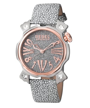 Rebel Women's RB104-5011 Coney IslandRebel Coney Island Silver Dial Women's Watch RB104-5011
Rebel Women's Watch from the Coney Island Collection
Round 316L Stainless Steel Silver Case
Silver Dial, Mineral Crystal
Smoke (light blue) Leather Band with Tang Buckle
Water Resistance: 5 ATM (50 meters, 165 feet)
11mm Case Thickness, 44mm Case Diameter, 22mm Band Width
Quartz Movement