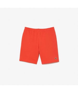 Men's Lacoste Organic Brushed Cotton Fleece Shorts Regular fit  straight cut: Unrestricted movement. Drawstring at waist: An adjustable waistband for optimal comfort. Piped back pocket: Practical and functional. Embroidered crocodile sewn onto front: Lacoste signature performance. Brushed organic cotton fleece: Long-lasting comfort during practice.