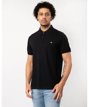 For impromptu tennis matches and alfresco dining to casual Fridays and everything in between –the versatile piqué polo shirt is a staple for a reason (meaning you can justify one in every color). This polo shirt keeps it easy, simple, and classic. With a regular fit and a traditional flat knit collar, details include a two-button placket, small side slits, and signature GANT logo embroidered at the chest.
Regular fit  Flat knit collar  GANT graphic embroidered at chest
&nbsp;
2210