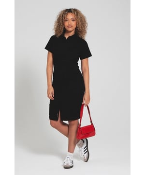 Step into effortless style with the 'Perse' short sleeve cargo dress by Bench. Boasting a smart shirt collar, convenient button-down fastening, and practical chest and side pockets, it seamlessly blends fashion and function for any outing. Elevate your wardrobe with this versatile piece, designed to keep you chic and prepared for every moment.