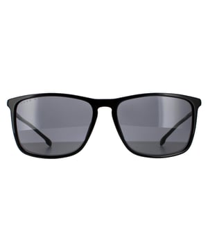 Gafas de sol Hugo Boss Rectángulo para hombre en negro y gris. Estas gafas de sol Hugo Boss tienen un diseño masculino con un marco rectangular súper delgado. Fabricadas en Italia con plástico ligero, son cómodas y duraderas, con el logo de Hugo Boss grabado en las delgadas varillas.