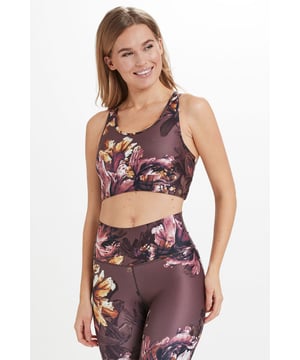 REASONS TO BUY:Â Almost too pretty to work out inGorgeous floral printHigh impact  high supportSexy racer backComfy sweat-wicking fabricMake a statement with the matching leggings