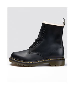 This is a winter twist on the classic Dr. Martens 8-eye boot. The Serena has the extra-tough, durable sole: chunky grooves with bars and stars underneath for solid footing. Even better? It&rsquo;s lined with soft, rich artificial white fur. Original Doc DNA is still intact, though— like yellow stitching, grooved sides, and heel loop. Winter never saw it coming.
The Serena is constructed on the iconic air-cushioned sole, that's oil-and-fat resistant with good abrasion and slip resistance—and has been since 1960. This shoe is Goodyear-welted, meaning the upper and sole are sewn together in heat-sealed z-welt stitch. It&rsquo;s made with Burnished Wyoming, a leather with a subtle grain and an oily surface, treated for an antique look.
21797001