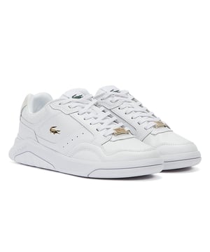 Update your shoes collection with Game Advance Luxe 0722 1 by Lacoste. These classic court trainers are crafted with leather uppers  faux-leather lining  perforated collar and classic lace up fastening to ensure comfort and a perfect fit. They are decorated with debossed gold crocodile on the side and metal lace aglets with branding lace jewel plaque.